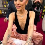 Ariana Grande signing fans pictures at the BAFTA’s – and everyone is saying the same thing