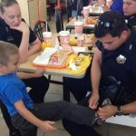 A Police Officer Helped a Little Boy Tie His Shoe—seconds Later, Everyone in the Restaurant Froze